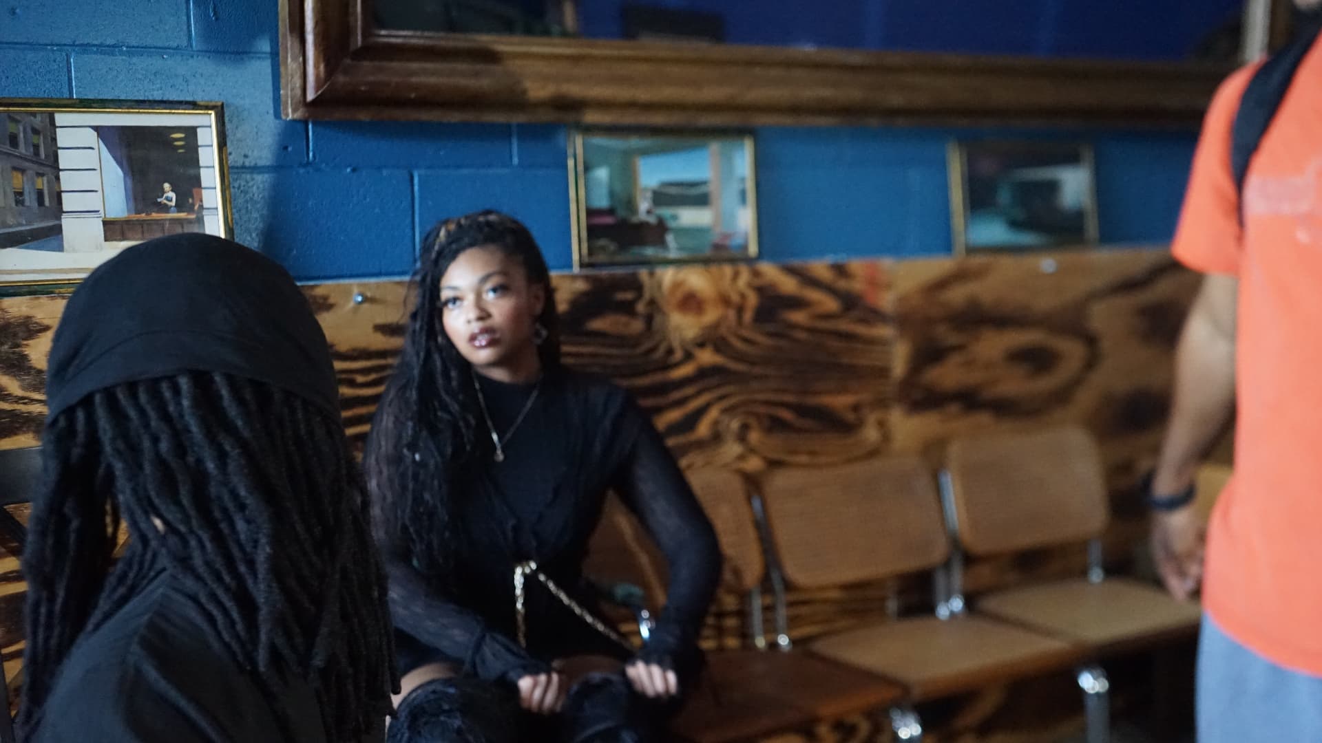 Aaniyah Anderson seated in a wood-paneled room during the Have It Your Way video shoot directed by Mac Infinity, New Orleans, August 17, 2026