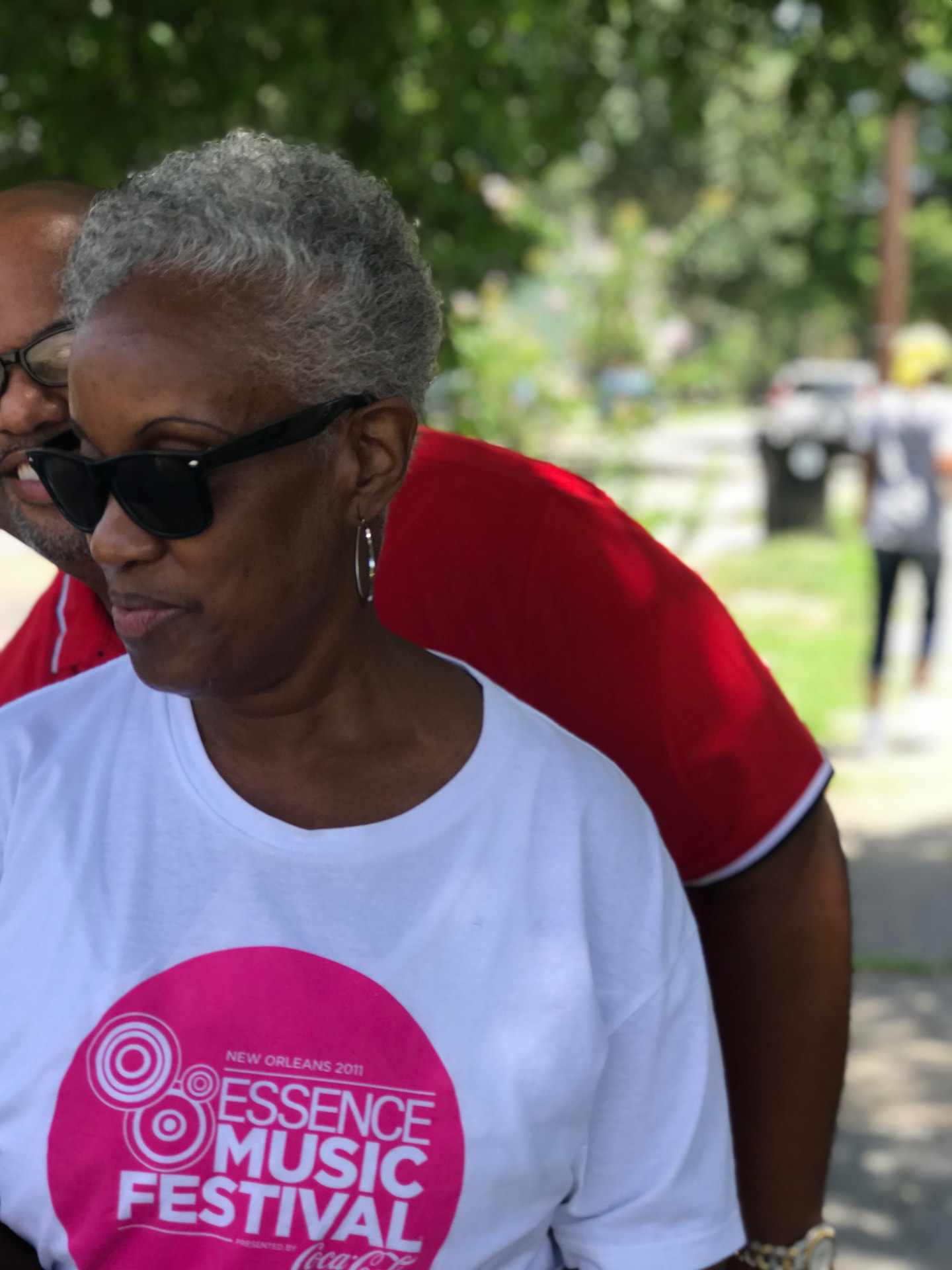 Momma Peggy in an Essence Music Festival T-shirt outdoors in New Orleans.